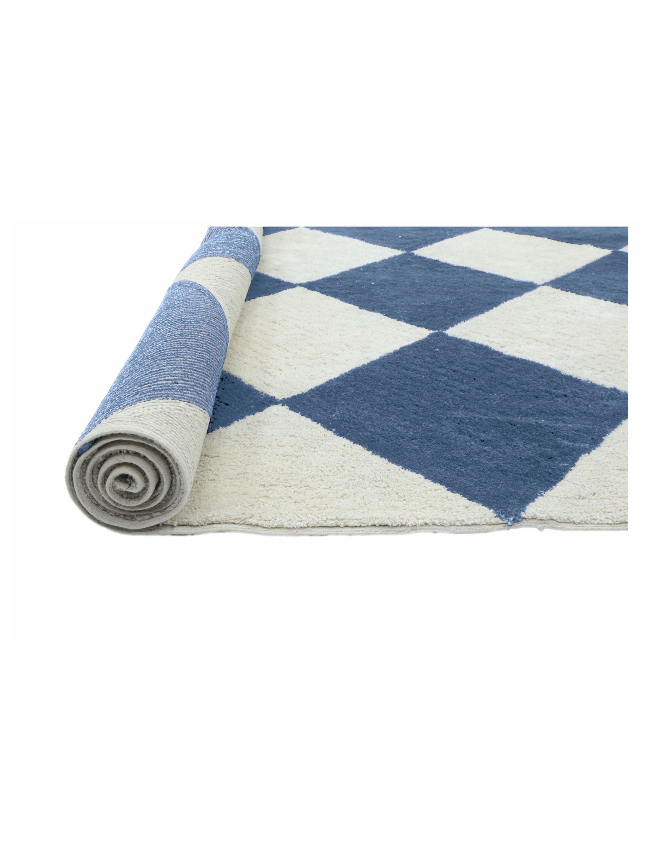 Rolled-up checkered rug with blue and white pattern on a white background