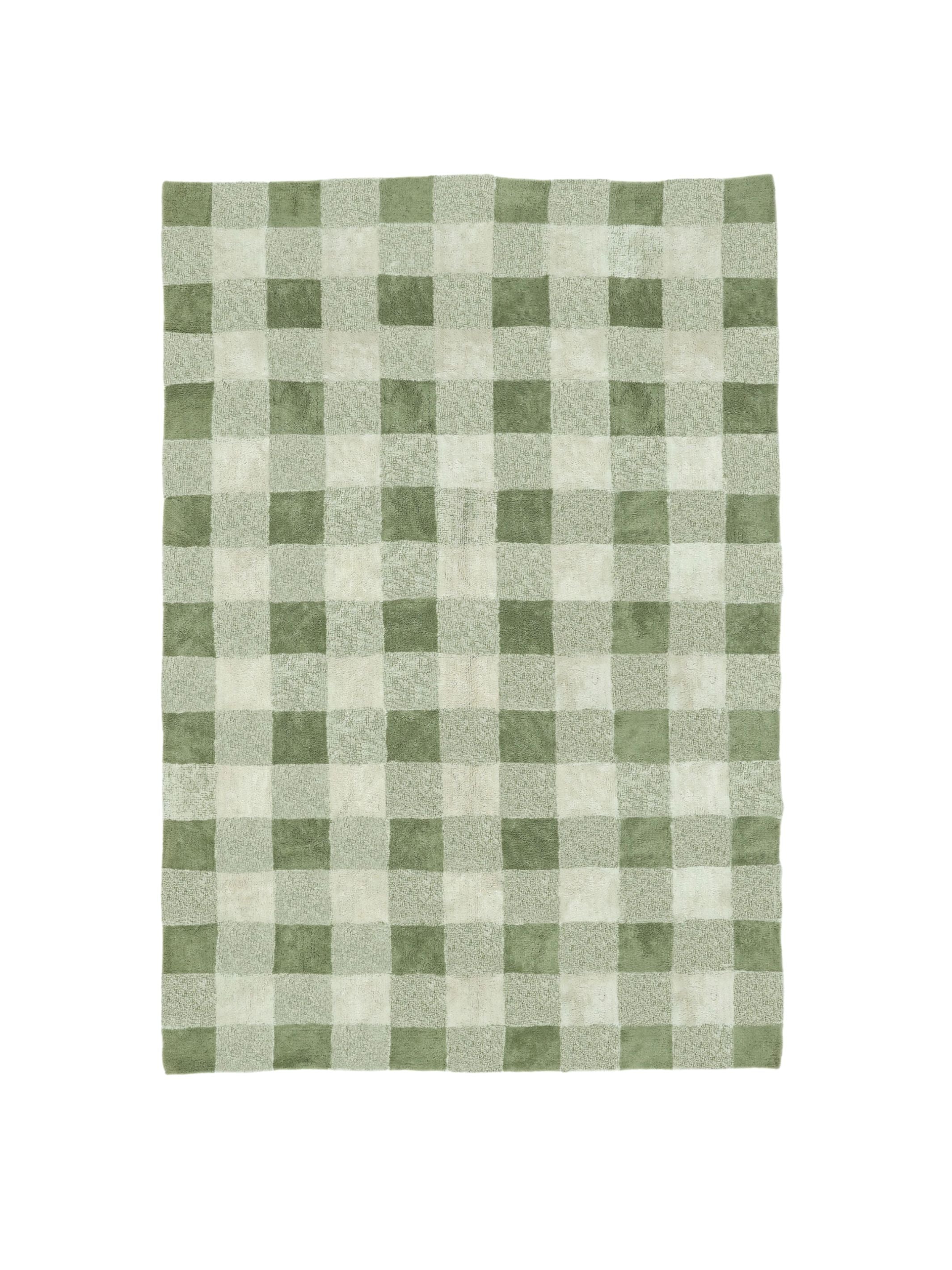 Green and white gingham rug on a white background