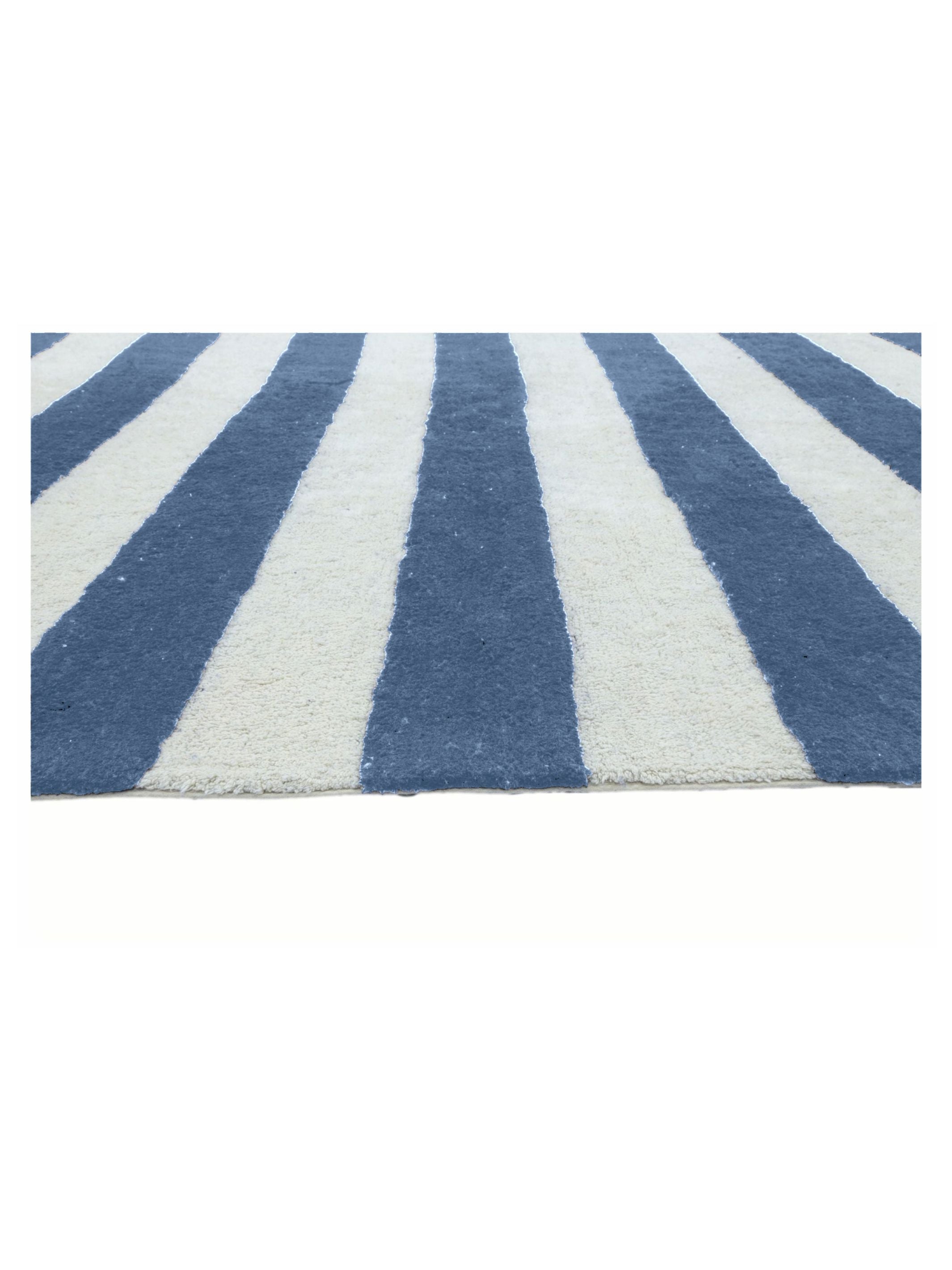 Blue and white striped rug on a white background